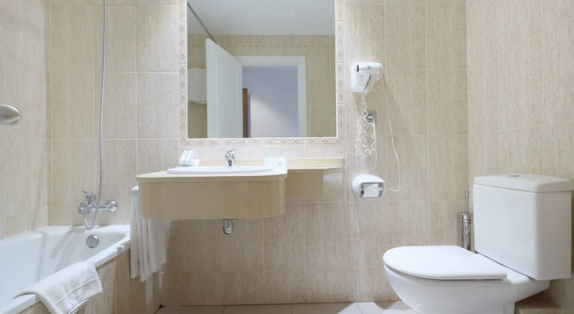 Четырёхместный семейный номер Standard Hotel Oasis con parking incluido