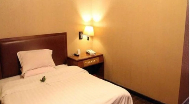 Xingchen Hotel, Boek Hotel Tanzhou Guangdong