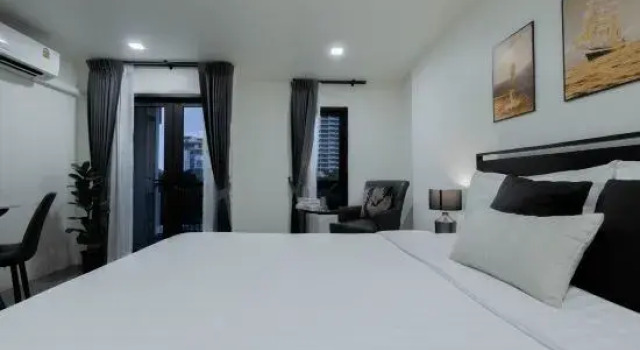 Номер Deluxe с балконом NORN Riverside Bangkok Hotel - นอนริมน้ำ
