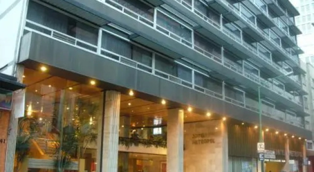 Кровать в общем номере Hotel Metropol