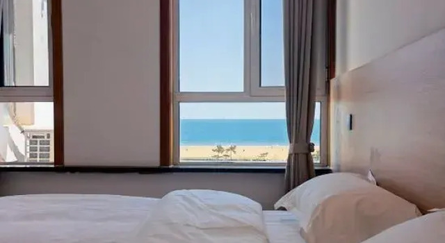 Двухместный люкс с 2 комнатами с видом на море Deep Blue 1996 Seaview Apartment (Qingdao Golden Beach Branch)