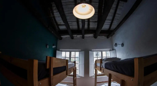 Кровать в общем номере Explora Hostels