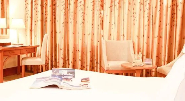 Номер Deluxe Sai Gon Dong Ha Hotel - a member of Saigontourist Group