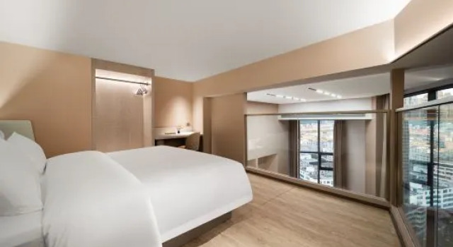 Люкс Business HanTing Hotel (Liupanshui Railway Station Zhongshan Avenue)