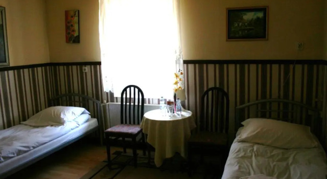 Кровать в общем номере Hotel Komfort Inn - Dwór Hubertus