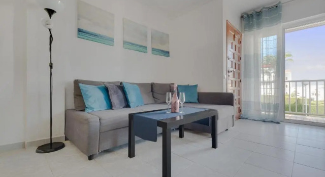Апартаменты Apartment with pool, sea views & balcony less than 10min walk to La Mata Beach!