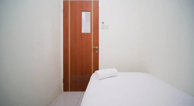 Cozy Living And Tidy 2Br At Puncak Dharmahusada Apartment