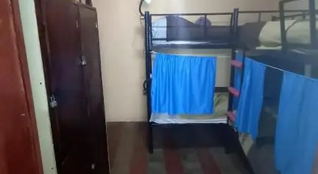 Кровать в общем номере Casa Vieja Guest House