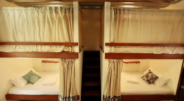 Кровать в общем номере LaFinca Hostel Siargao