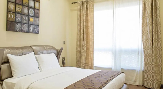 Stay at the Landmark Suites And Relax by the Pool And Enjoy the Amenities