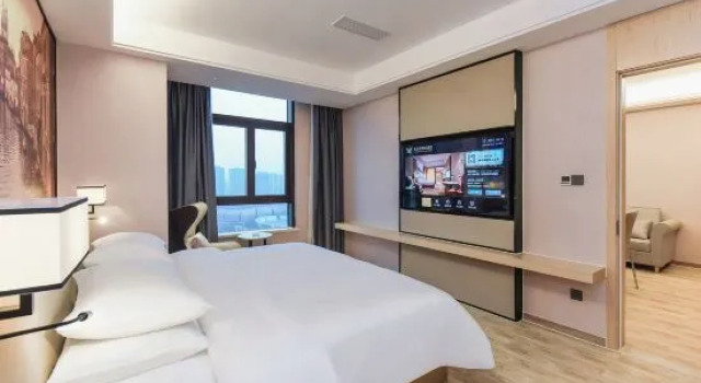 Люкс с красивым видом из окна Vienna International Hotel (Nanchuan District Wanda Plaza)