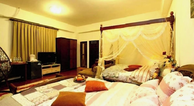 Номер Deluxe 水悅雅築民宿 Shuiyue Guest House