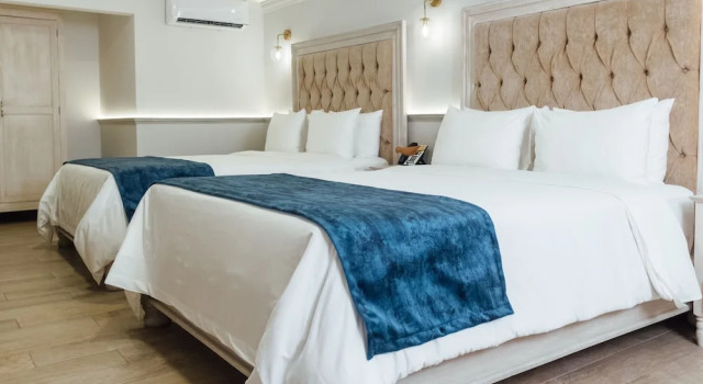 Четырёхместный люкс voco Royalty Puebla Downtown by IHG
