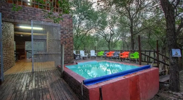 Kruger Wild Dog Inn, Reservar Hotel Hotéis baratos em Barberton