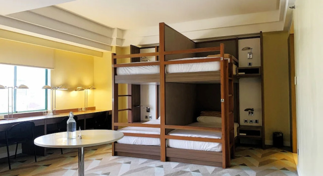 Кровать в общем номере Hotel Benilde Maison De La Salle