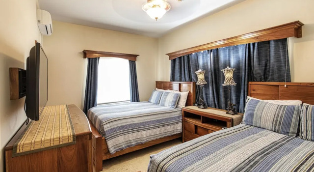Номер Premier с 3 комнатами с балконом и с видом на бассейн Hol Chan Reef Resort & Villas