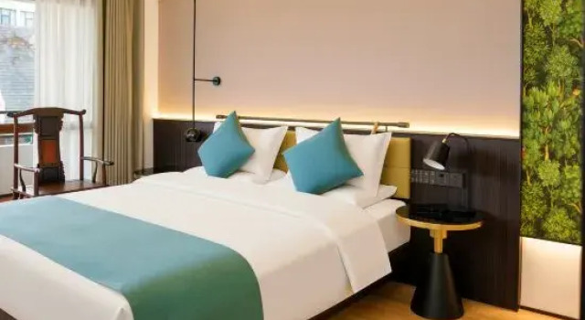 Люкс Xiyuexing Cultural Tourism Hotel (Menla Nanla River Starlight Night Market Branch)