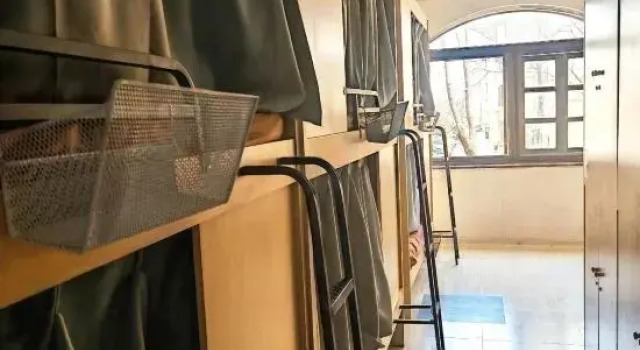 Кровать в общем номере Yuanzu International Youth Hostel