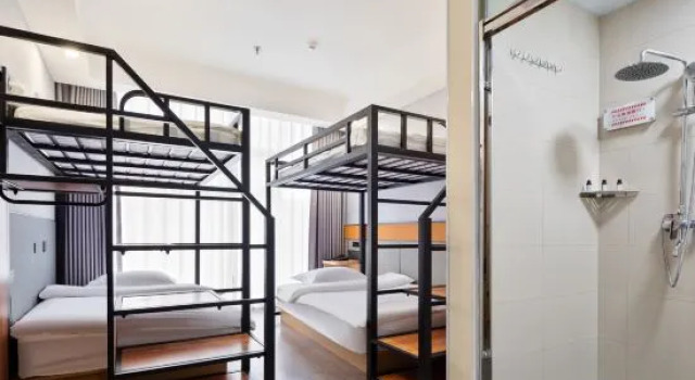 Кровать в общем номере Chuangdian Jingzhixuan Hotel (Guangming Road)