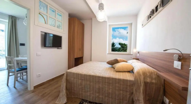 Апартаменты B&B Madonna Carradori