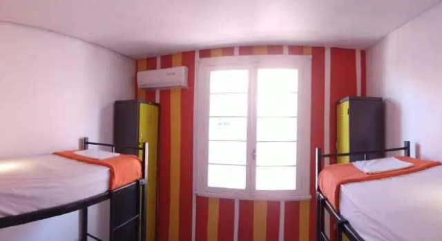 Кровать в общем номере POA Eco Hostel