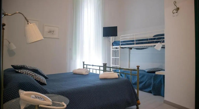 Четырёхместный номер Hotel Posta