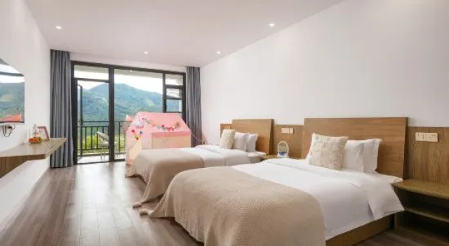 Кровать в общем номере Mogan Mountain Wangxuan Tower Light Luxury Mountain Residence