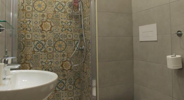Четырёхместный номер Deluxe с балконом B&B alla Ferrovia