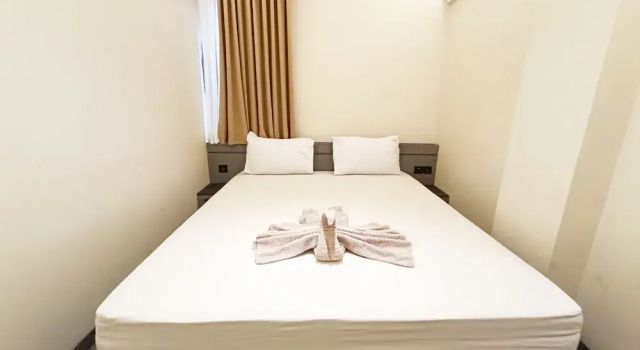 Номер Deluxe Nusantara Perintis Bogor By Reccoma