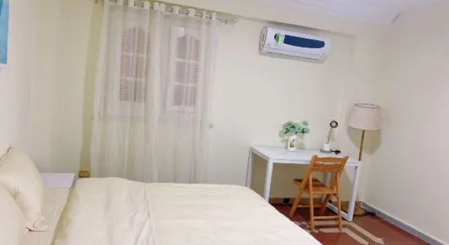 Кровать в общем номере Lemon Tree & Home 2