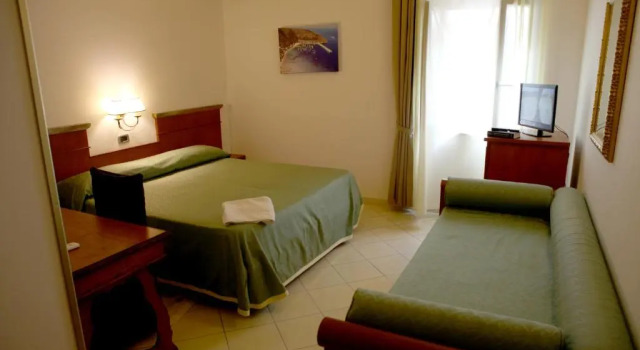 Трёхместный номер Hotel La Torre