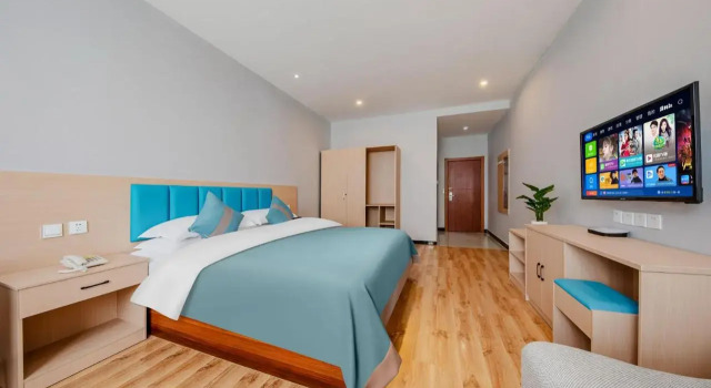 Kunming Changshui Airport Dezun Business Hotel, Rezerwuj Hotel Hotele w Kunming z parkingiem, Parking