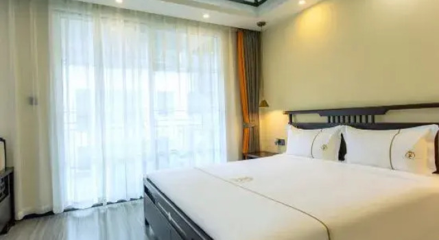 Jishu Holiday Apartment (Menghai Mengbala Store), Rezerwuj Apartament Hotele w Menghai z basenem, Basen