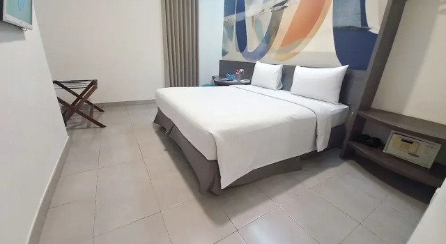 Номер Deluxe Hotel 88 Kedoya Jakarta