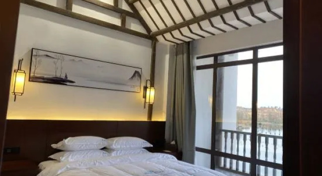 Люкс Grand Fuyang Huaiwang Bieyuan Homestay (Raozhou Ancient Town Branch)