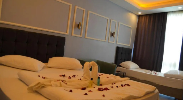 Luksusowy trzyosobowy pokój Cois Inn Royal Hotel