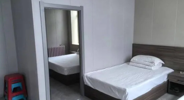 Люкс Guangyi Hotel (Hegang Er Branch)