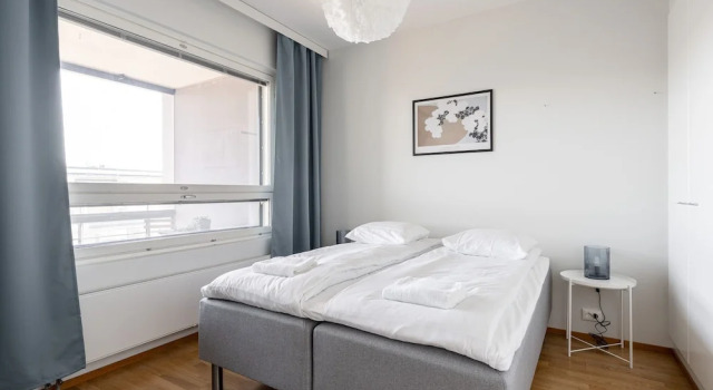 Top Floor 1BR Home with Parking, Sauna and Balcony