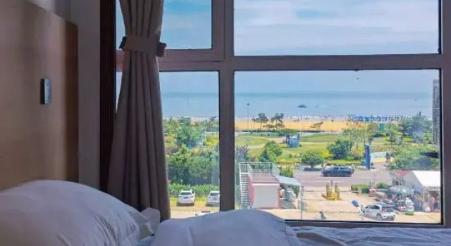 Люкс с 3 комнатами с видом на океан Deep Blue 1996 Seaview Apartment (Qingdao Golden Beach Branch)