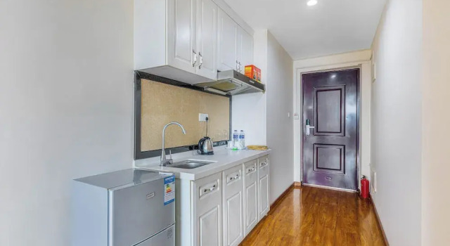 Номер Standard Home Inn Huayi Apartment