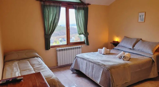 Кровать в общем номере Hosteria Bella Vista