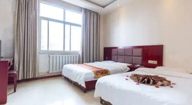 Люкс Deluxe Yuzhong Sanxing Express Hotel