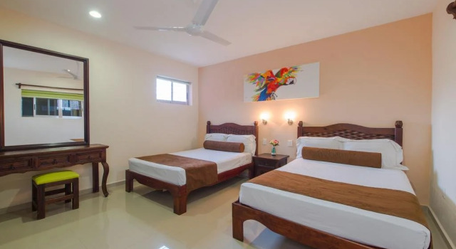 Hotel Papagayo, Забронировать Бутик-отель Плая-дель-Кармен Кинтана-Роо, рядом с Пляжный клуб Mamitas