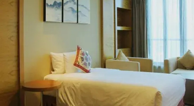 Семейный люкс Xinhua Media GDH International Hotel