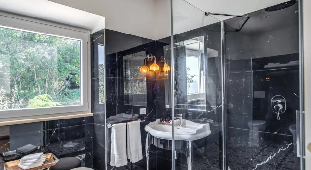 Номер Deluxe Vigna Caio Relais & Spa