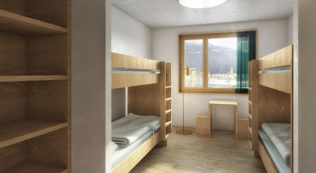 Кровать в общем номере Laax wellnessHostel3000