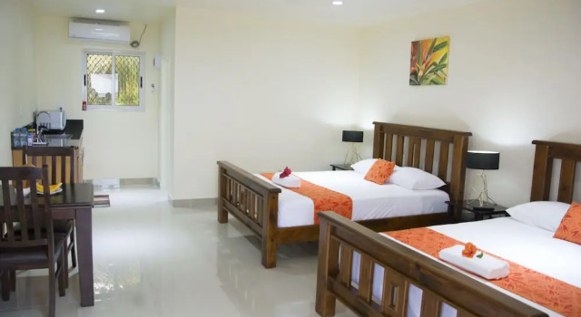 Четырёхместный номер Deluxe с балконом и с видом на горы Samoana Boutique Hotel