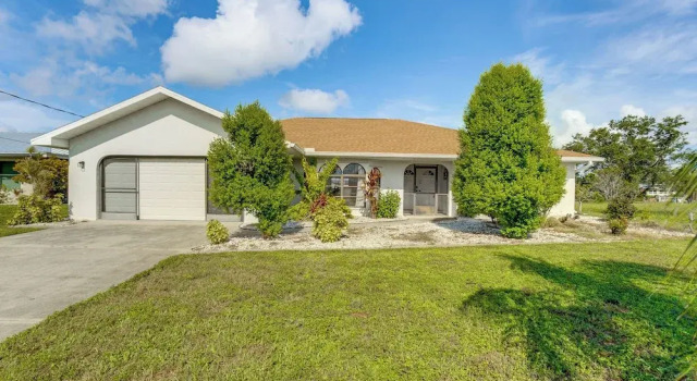 Коттедж 4 Mi to Beach: Canal-front Home in Port Charlotte!