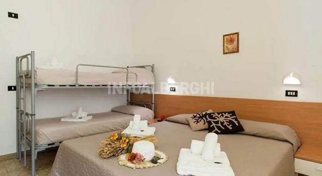 Четырёхместный номер Economy Hotel La Pergola