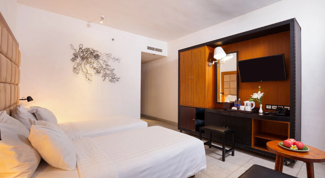 Номер Deluxe с видом на бассейн Отель The 101 Bali Fontana Seminyak